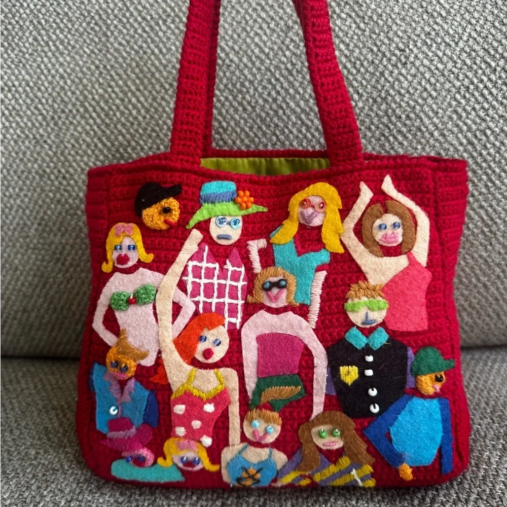 Michael Simon Red knit women’s tote with felt and embroidered people